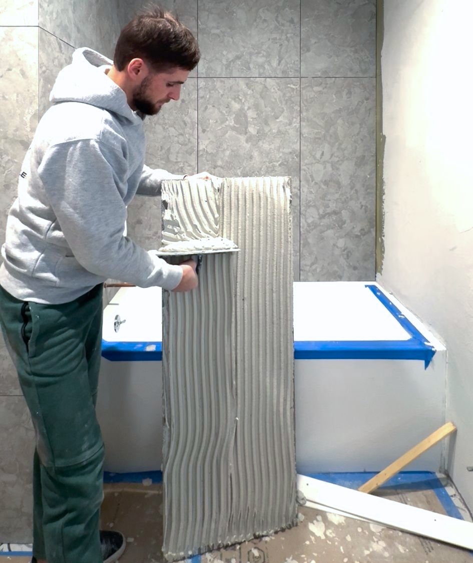 NYC tile installer installing bathroom wall tile