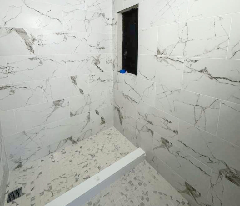 Modern grey shower tile installation in NYC